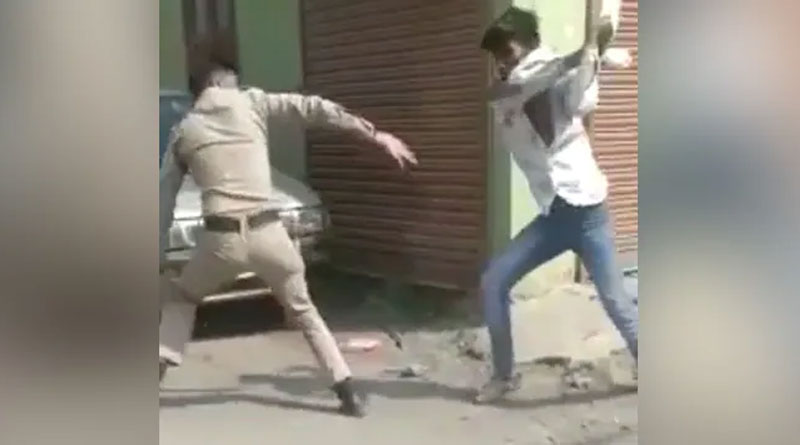 Man Snatches Cop's Baton Thrashes Him After a Minor Accident | Sangbad Pratidin
