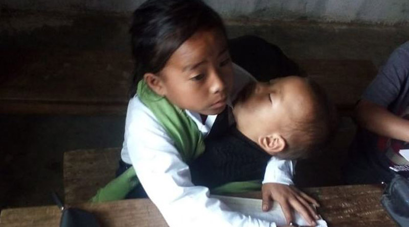 Manipur Girl Babysits while Studying in School | Sangbad Pratidin