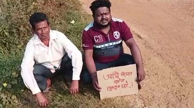 A youth stage protest in front of in laws house in Pingla | Sangbad Pratidin