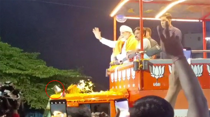 Karnataka Cops Says BJP Worker Threw Phone At PM's Vehicle In Excitement | Sangbad Pratidin