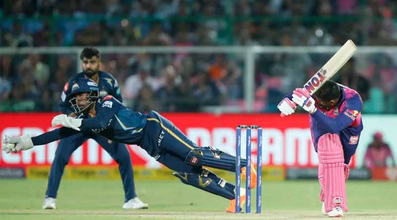 Wriddhiman Saha dives to save four wides off Noor Ahmad । Sangbad Pratidin