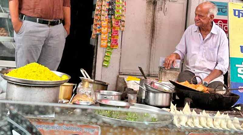 Old man selling food only for happiness not for earn money। Sangbad Pratidin