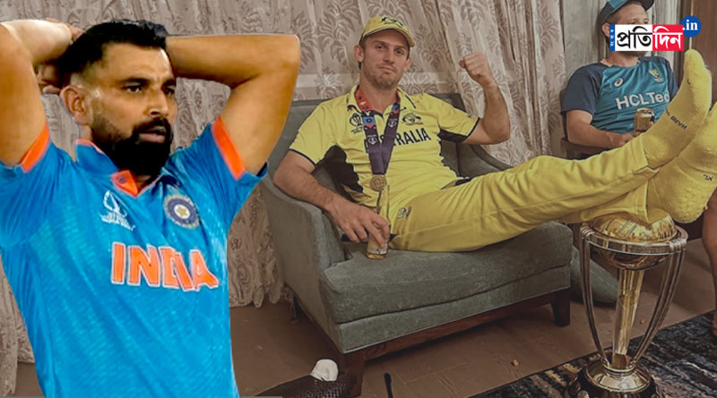 Indian pacer Mohammed Shami reacts to Mitchell Marsh as he put his feet on World Cup trophy । Sangbad Pratidin