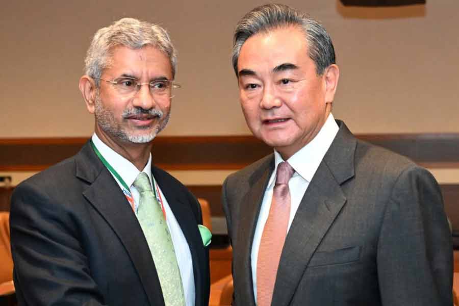 S Jaishankar's brief interaction with China counterpart। Sangbad Pratidin