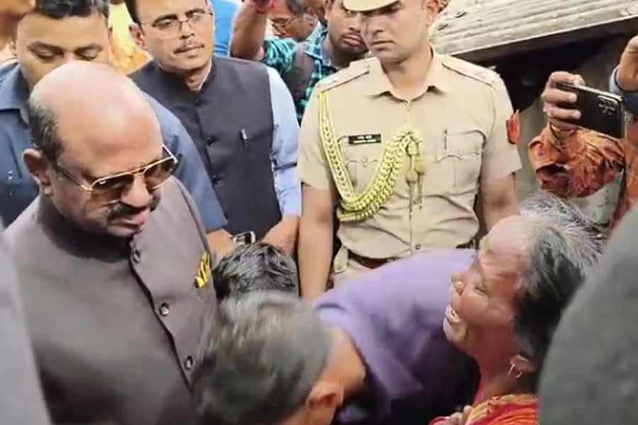 Slain BJP worker's mother seeks justice from WB Guv C V Ananda Bose