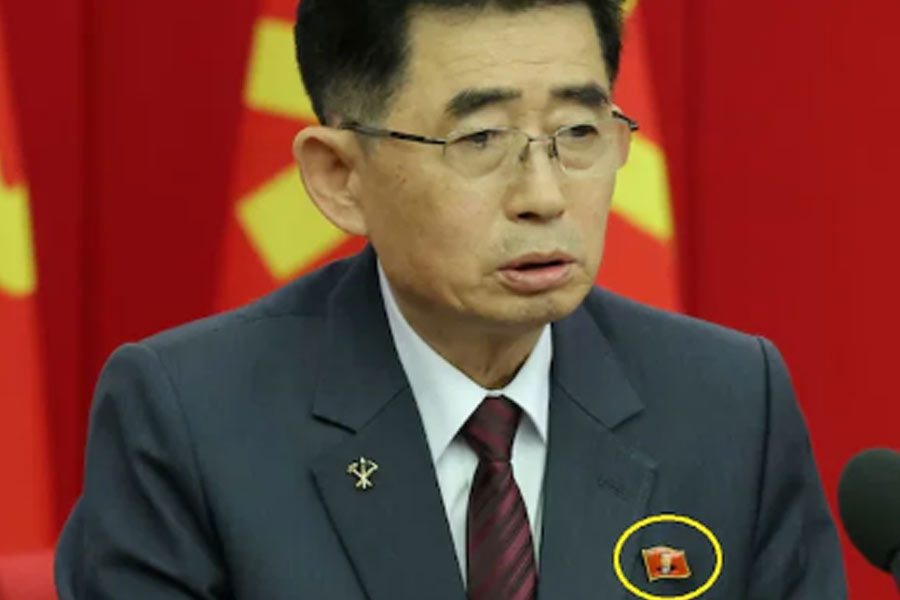 Kim Jong Un's portrait pin seen on North Korean officials for first time