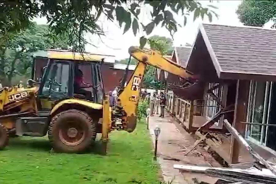 Porsche crash accused father resort demolished by bulldozer