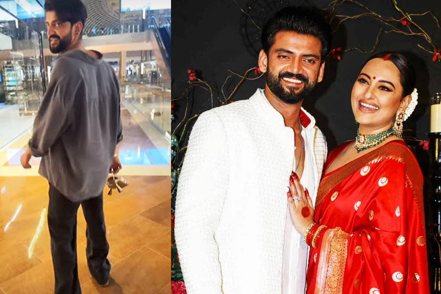 Zaheer Iqbal Carries Sonakshi Sinha's Heels, See Here