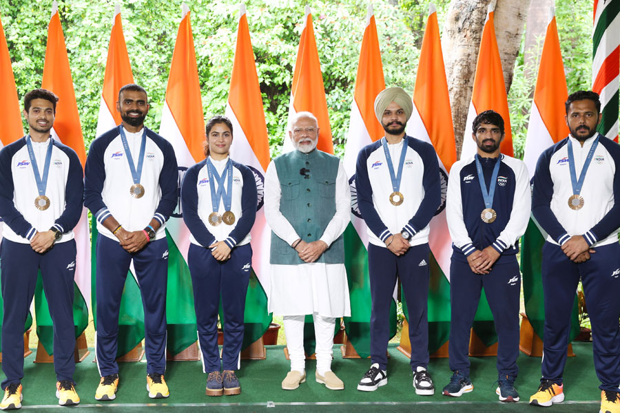 PM Narendra Modi meets Indian contingent that represented in the Paris Olympics