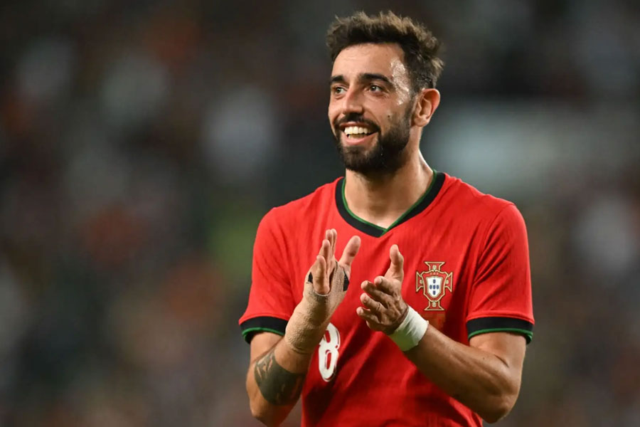 Bruno Fernandes: The Portuguese footballer helps an unwell passenger during flight to Lisbon