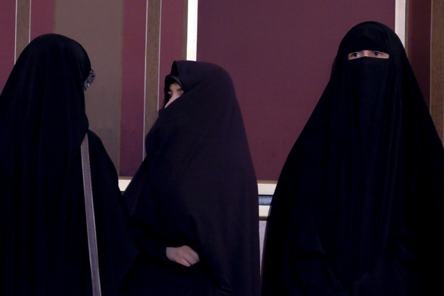 Iran woman strips in protest