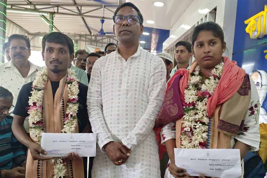 TMC Canning MLA Pareshram Das next to meritorious students
