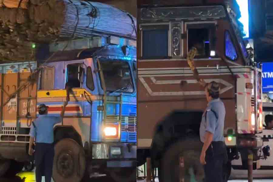 Barasat Civic Volunteer allegedly taking money from overloaded car drivers, viral video