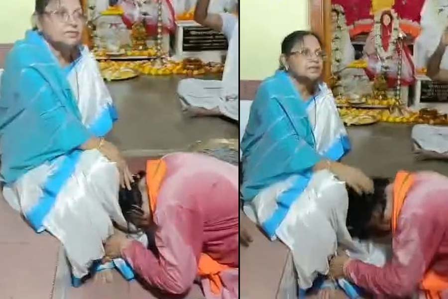 BJP MLA touches feet of Mamatabala Thakur at Baruni fair