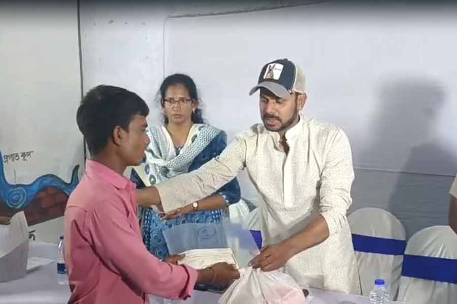 cheques distributed to landslide victims in Belgachia, Howrah