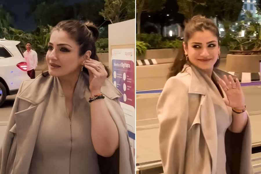 Raveena Tandon Gifts Her Gold Earrings To Paparazzo At Airport