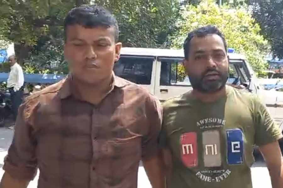 arrested in international call center racke in Newtown