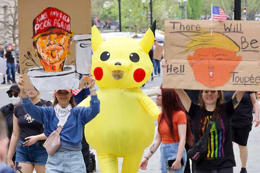 Pikachu steals the thunder at 'Hands Off!' protests against Donald Trump