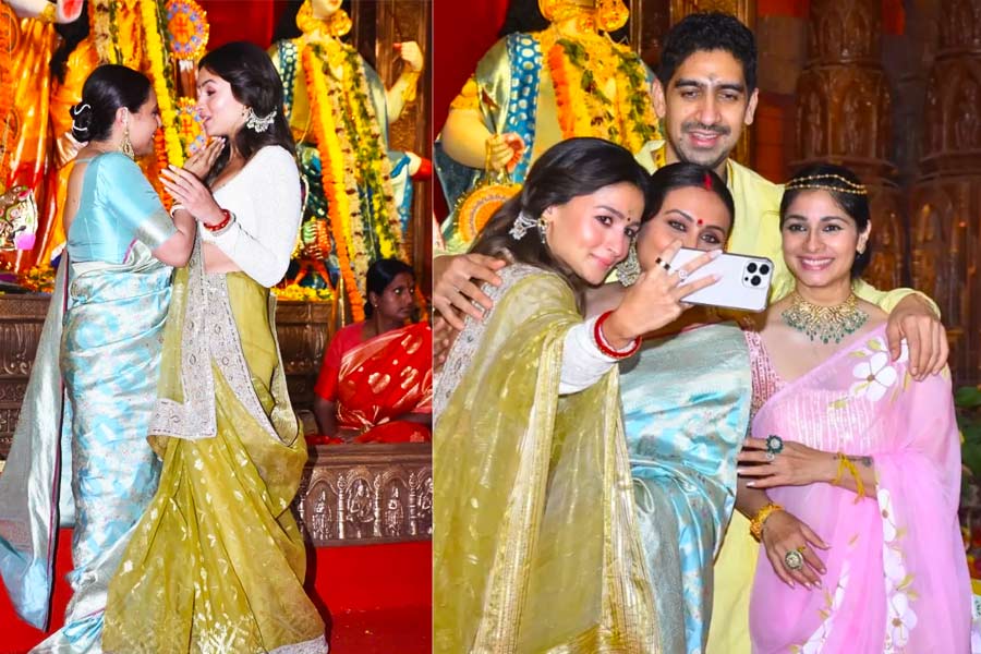 নবরাত্রির সাজে আলিয়া যেন রাজরানি! মুখার্জিদের দুর্গাপুজোয় যেতেই আদরে ভরালেন রানি