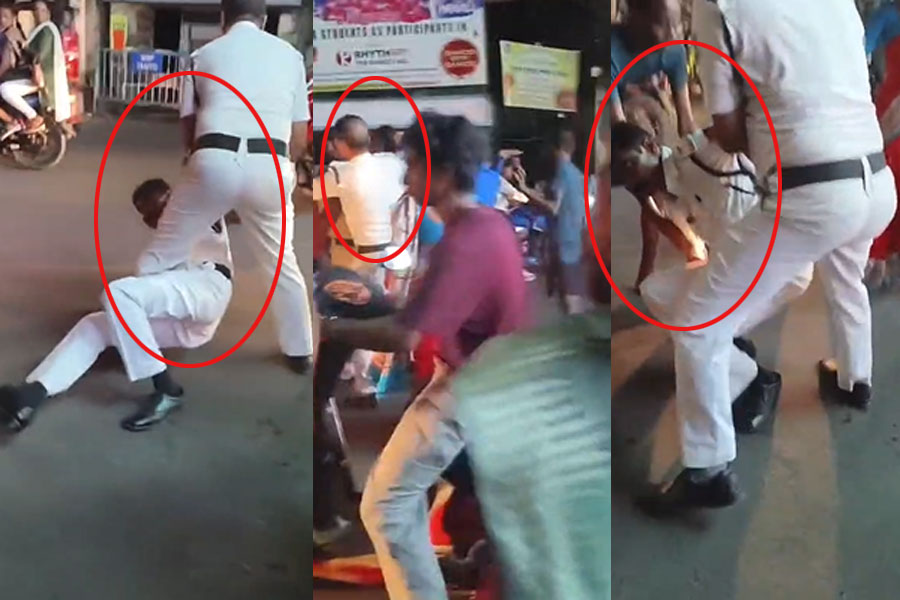 নেশায় চুর, লুটিয়ে পড়ছেন রাস্তায়! ভাইরাল দশমীর রাতের ট্রাফিক ইন্সপেক্টরের কীর্তি
